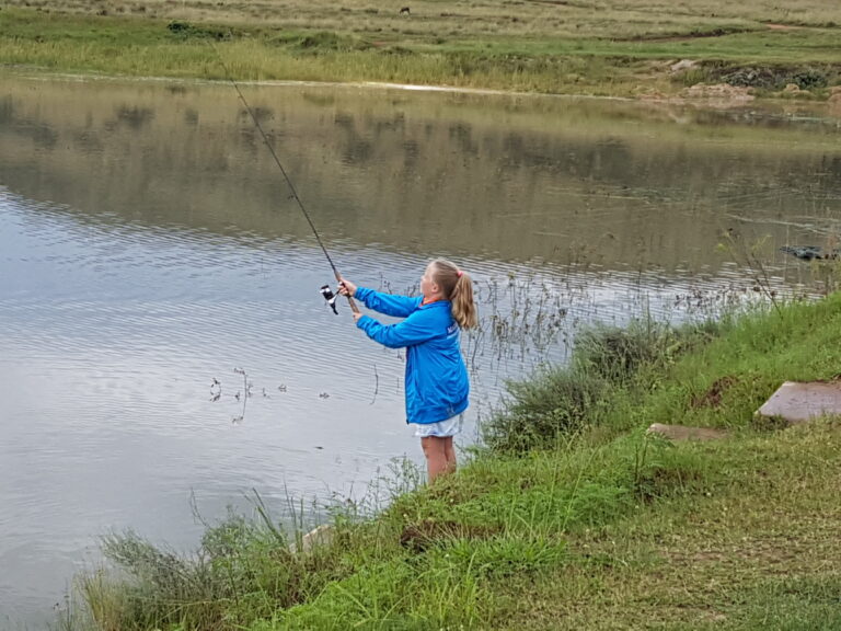 Kyla catching fish at Zelpy Fishing and Game Reserve